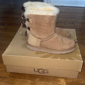Bow tie Uggs! Worn a few times!!! Comes with box.